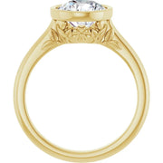 The image depicts a close-up of a 14K yellow gold engagement ring from a perspective as if looking through the center of the ring. The gallery is designed like a flower basket, with petals curled upwards. The center of the ring is empty, intended to hold a diamond. The background is white.  Given the perspective, additional details such as the ring's width and the design intricacies on the basket are not visible.